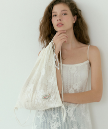 LUCIR ZU（ルシールズ）の「Wildflower Lace String Backpack (ivory)（バックパック/リュック）」