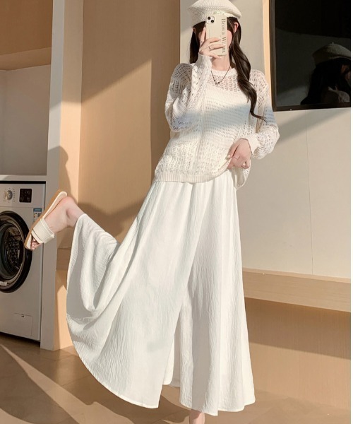 Mejoul(メジュール)の「ワイドルーズシルエットフレアパンツ(その他パンツ・レディース・ブラック/ホワイト・F)」の1枚目の写真