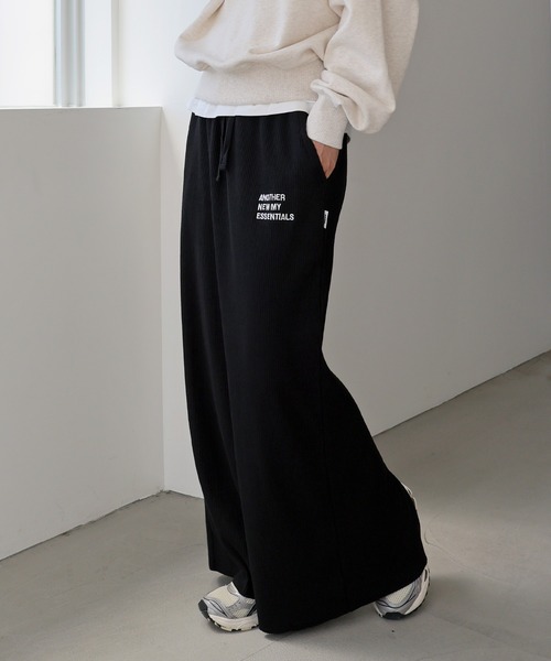 ANME(アンメ)の「セルフカットリブANMEエンブロイダリーロゴタイトスカート(スカート・レディース・ダークネイビー/ベージュ系その他/ブラック/杢グレー・M/L)」の1枚目の写真