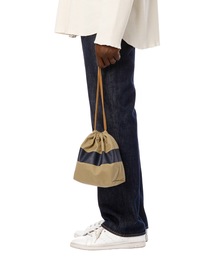 DAILY STANDARD by SANDINISTA（デイリースタンダードバイサンディニスタ）の「Chino Drawstring Line Print Bag / ラインプリント入り巾着（ショルダーバッグ・メンズ）」
