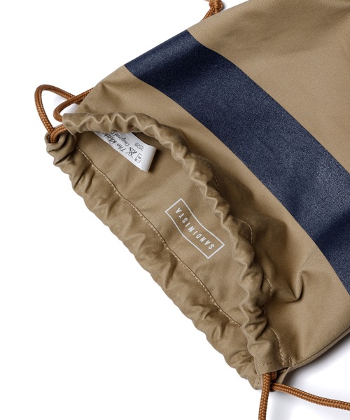 DAILY STANDARD by SANDINISTA(デイリースタンダードバイサンディニスタ)の「Chino Drawstring Line Print Bag / ラインプリント入り巾着(ショルダーバッグ・メンズ・ベージュ系その他/ベージュ系その他2・FREE)」の13枚目の写真