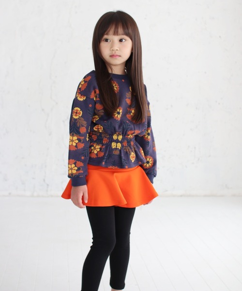 Rora(ローラ)の「エンターテイナー スカートパンツ (2color)(スカート・キッズ・オレンジ/ネイビー・100/150/110/120/130/140)」の1枚目の写真