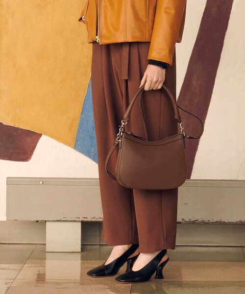 tk.TAKEO KIKUCHI(ティーケータケオキクチ)の「◆シンセティックレザー2WAYムーンバッグ(ショルダーバッグ・レディース・ブラック/ブラウン系その他・00)」の2枚目の写真