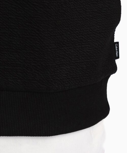 Calvin Klein(カルバン・クライン)の「クルーネック スウェット プルオーバー(スウェット・メンズ・ホワイト/ブラック・S/M/L/XL)」の8枚目の写真