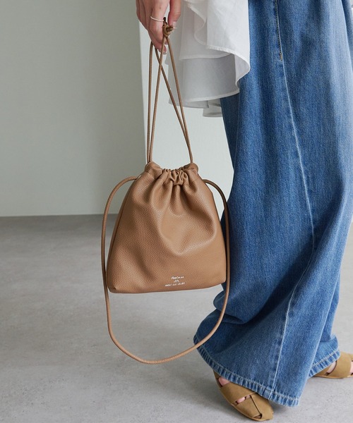 PUAL CE CIN(ピュアルセシン)の「フェイクレザー巾着バッグ(ショルダーバッグ・レディース・ブラック/ブラウン・FREE)」の1枚目の写真