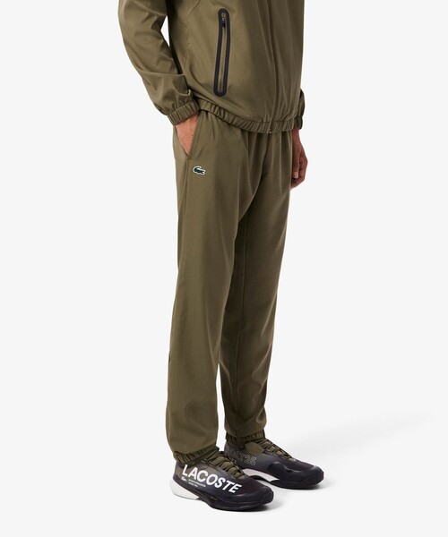 LACOSTE（ラコステ）の「スタンドカラー ミニマルデザイン テクニカルトラックスーツ（ジャージ・メンズ・オリーブ・3/5/4）」の10枚目の写真