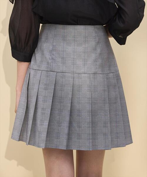 SWINGLE（スウィングル）の「金ボタンアシメプリーツスカート（スカート・レディース・ダークブルー/ブラック系その他5・SMALL/MEDIUM）」の9枚目の写真