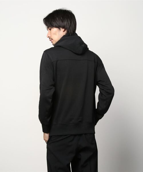 Calvin Klein Jeans(カルヴァンクラインジーンズ)の「AF オフプレイスド アイコニック パーカー(パーカー・メンズ・ブラック/ブラウン・S/M/L/XL)」の4枚目の写真
