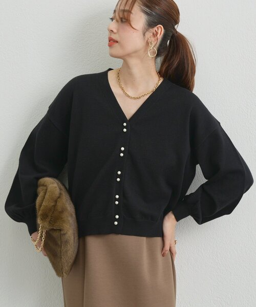 パール釦ショートカーディガン un dix cors（アンディコール）の「《さりげなく大人可愛い》Wパール釦