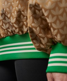 アディダス ウインドブレーカーアディカラー 70S ハーフジップ モノグラム L adidas（アディダス）の「アディカラー 70s ハーフジップ