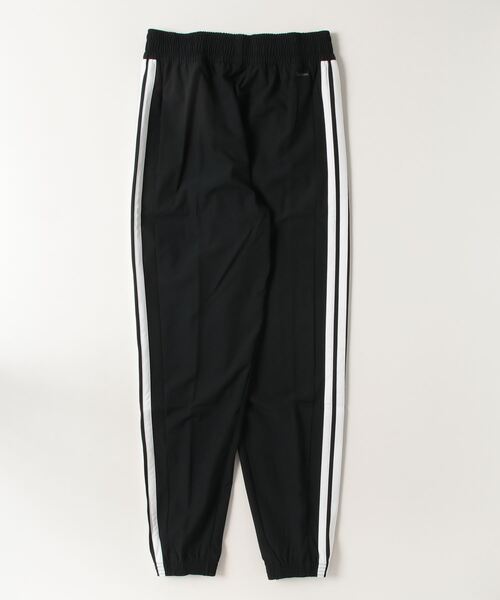 トレイン エッセンシャルズ スリーストライプス ウーブンパンツ