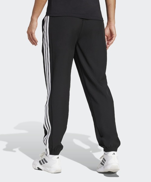 トレイン エッセンシャルズ スリーストライプス ウーブンパンツ