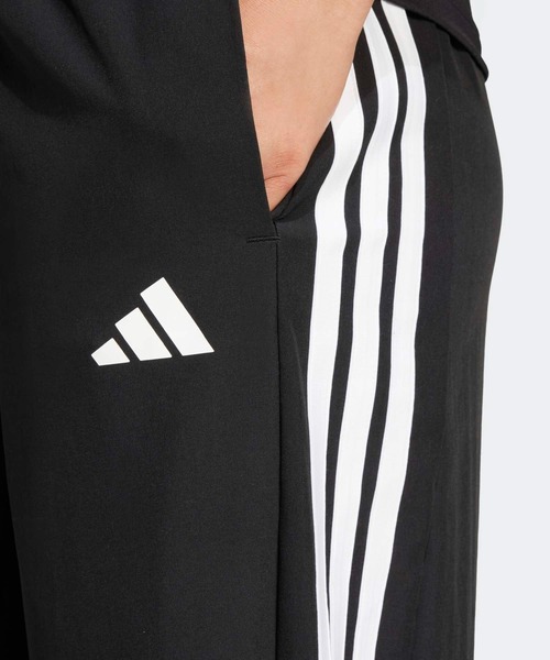 トレイン エッセンシャルズ スリーストライプス ウーブンパンツ