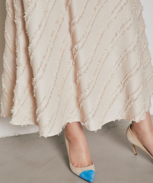 &. NOSTALGIA（アンドドットノスタルジア）の「フリンジタイトフレアスカート（スカート・レディース・ベージュ/ブラック・M）」の3枚目の写真