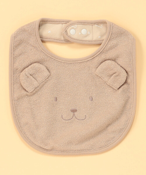 COMME CA ISM(コムサイズム)の「【リバーシブル】クマ耳付き スタイ(その他ベビー用品・キッズ・モカ/アイボリー・FREE)」の1枚目の写真