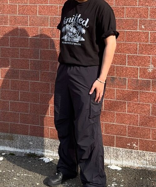 KNITTED(ニッティド)の「(ユニセックス) ピグメント パームツリー グラフィック Tシャツ クロップ ブラック(Tシャツ/カットソー・メンズ・その他・MEDIUM/LARGE/X-LARGE)」の11枚目の写真