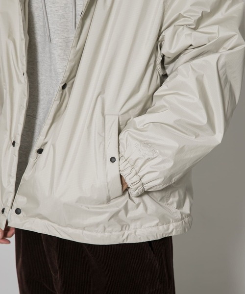 NANGA(ナンガ)の「『別注』NANGA×EKAL コーチジャケット(ブルゾン・メンズ・ブラック/アイボリー・MEDIUM/LARGE)」の15枚目の写真