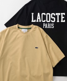 LACOSTE（ラコステ）の「【LACOSTE/ラコステ】クロコエンブレムワッペン＆バッグBIGロゴ プリントデザイン クルーネックTシャツ/半袖T（Tシャツ/カットソー・メンズ）」