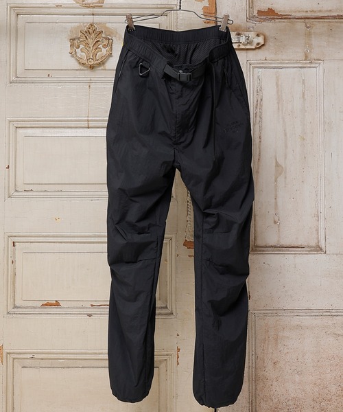 NUMBER (N)INE(ナンバーナイン)の「NUMBER (N)INE/ナンバーナイン TRACK PANTS/ベンチレーション シリコンプリント ナイロントラックパンツ/メッシュ裏地(その他パンツ・メンズ・ブラック/オリーブ/ベージュ・2/4/3)」の2枚目の写真