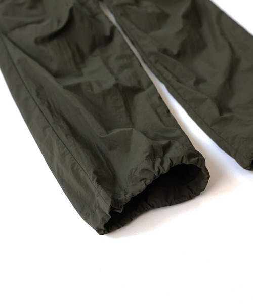 NUMBER (N)INE(ナンバーナイン)の「NUMBER (N)INE/ナンバーナイン TRACK PANTS/ベンチレーション シリコンプリント ナイロントラックパンツ/メッシュ裏地(その他パンツ・メンズ・ブラック/オリーブ/ベージュ・2/4/3)」の4枚目の写真