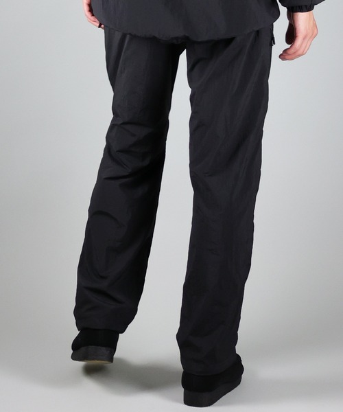 NUMBER (N)INE(ナンバーナイン)の「NUMBER (N)INE/ナンバーナイン TRACK PANTS/ベンチレーション シリコンプリント ナイロントラックパンツ/メッシュ裏地(その他パンツ・メンズ・ブラック/オリーブ/ベージュ・2/4/3)」の9枚目の写真