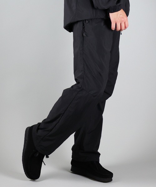 NUMBER (N)INE(ナンバーナイン)の「NUMBER (N)INE/ナンバーナイン TRACK PANTS/ベンチレーション シリコンプリント ナイロントラックパンツ/メッシュ裏地(その他パンツ・メンズ・ブラック/オリーブ/ベージュ・2/4/3)」の11枚目の写真