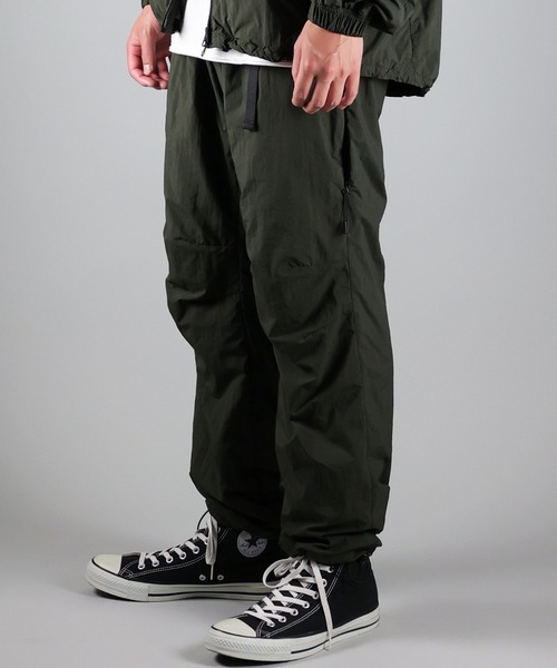 NUMBER (N)INE(ナンバーナイン)の「NUMBER (N)INE/ナンバーナイン TRACK PANTS/ベンチレーション シリコンプリント ナイロントラックパンツ/メッシュ裏地(その他パンツ・メンズ・ブラック/オリーブ/ベージュ・2/4/3)」の16枚目の写真