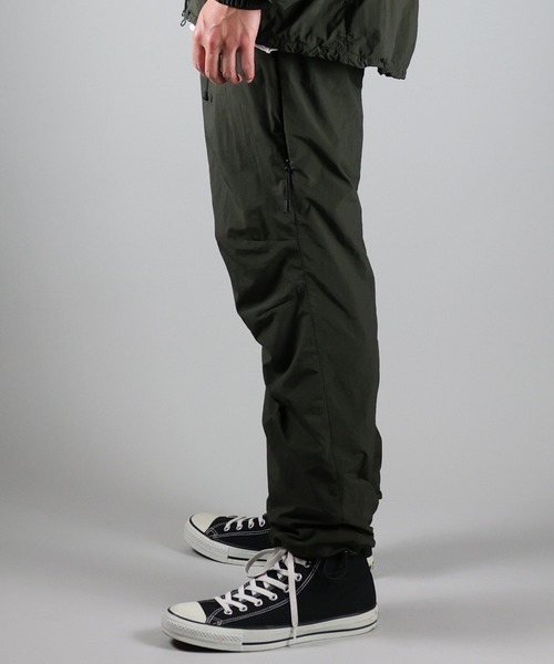 NUMBER (N)INE(ナンバーナイン)の「NUMBER (N)INE/ナンバーナイン TRACK PANTS/ベンチレーション シリコンプリント ナイロントラックパンツ/メッシュ裏地(その他パンツ・メンズ・ブラック/オリーブ/ベージュ・2/4/3)」の18枚目の写真
