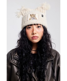 WHITE SANDS（ホワイトサンズ）の「アニマルワッペン タッセル付き イヤービーニー【ヒョウ】(アイボリー)（ニットキャップ/ビーニー）」