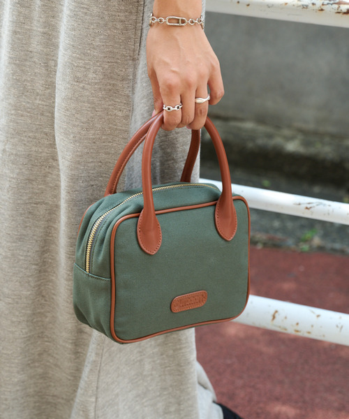 OUTDOOR PRODUCTS(アウトドアプロダクツ)の「CANVAS LEATHER CUBE BAG(ショルダーバッグ・レディース・カーキ/ネイビー・FREE)」の1枚目の写真