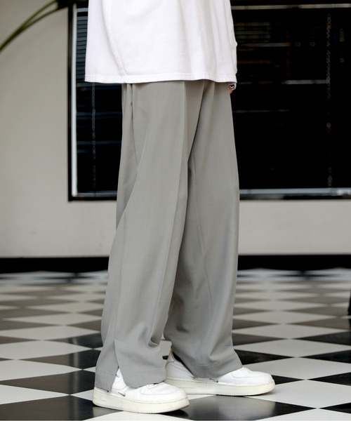 neos(ネオス)の「【neos -addictive design-】ルーズシルエット 裾スリット ストレッチ スラックス ワイドパンツ(スラックス・メンズ・オフホワイト/ブラック/グレー/ベージュ・MEDIUM/LARGE/X-LARGE)」の1枚目の写真