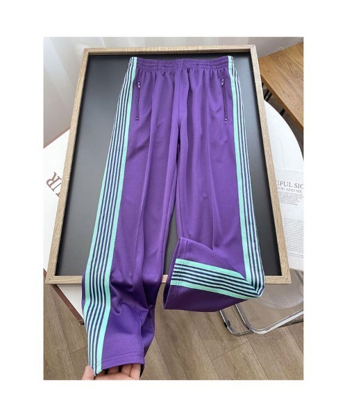 .KOM（ドットコム）の「A'GEM/9 × .kom『ARULE/アルール』ワイドシルエット サイドライン ポケット パンツ（その他パンツ・メンズ・アイボリー/ブラック×ホワイト/ブラック×ゴールド/グリーン/パープル・L/M）」の6枚目の写真