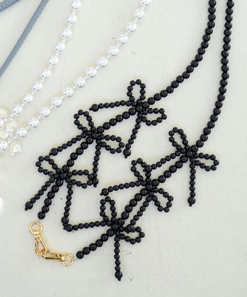 tiny tiny（ティニーティニー）の「リボンモチーフスマホストラップ[tiny tiny(ティニーティニー)]（スマホグッズ・レディース・その他1/ブラック/その他2・0）」の2枚目の写真