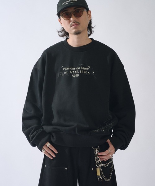 Lui's(ルイス)の「SURJENT オーバーサイズステンシルスウェット(スウェット・メンズ・グレー/ブラック・1/2)」の1枚目の写真