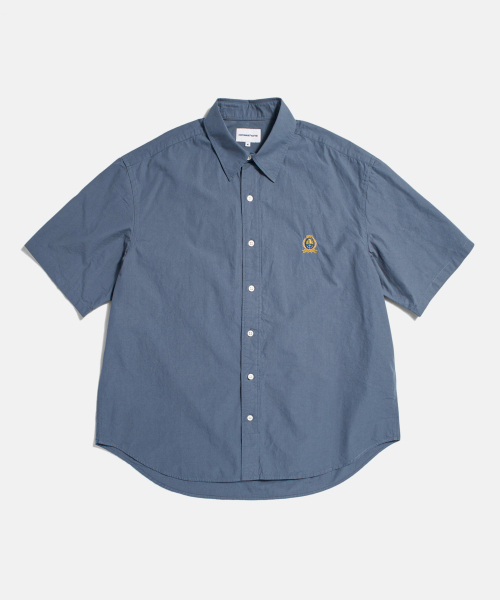 ESPIONAGE(エスピオナジ)の「クレスト ロゴ S/S オーバーシャツ デニム ブルー(シャツ/ブラウス・レディース・その他・MEDIUM/LARGE/X-LARGE)」の1枚目の写真