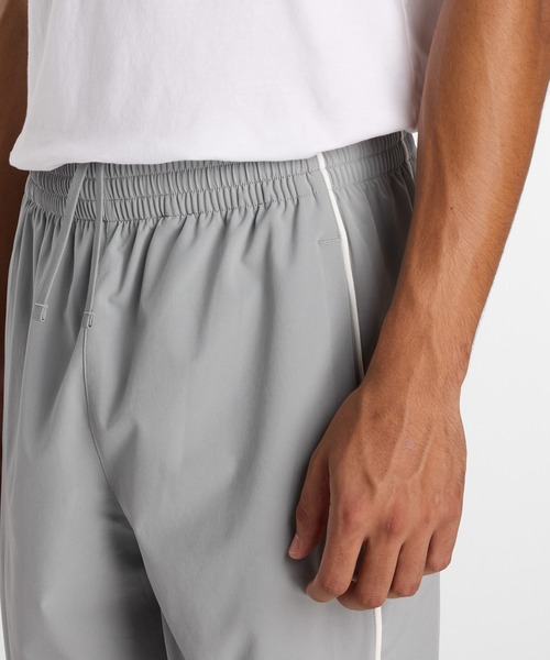 NEW BALANCE(ニューバランス)の「ウーブンワイドパンツ(スウェットパンツ・メンズ・ブラック/ライトグレー/ネイビー・SMALL/MEDIUM/LARGE/X-LARGE/XX-LARGE)」の13枚目の写真
