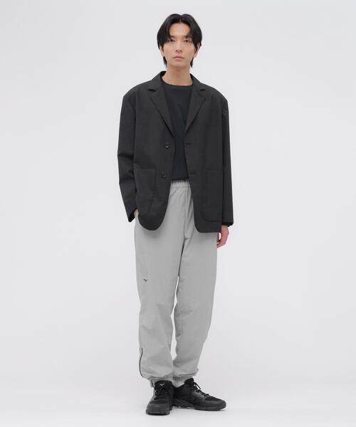 MARGARET HOWELL(マーガレットハウエル)の「RECYCLED NYLON LIGHTWEIGHT RIP STOP TROUSERS(その他パンツ・メンズ・ネイビー系1/グレー系その他・MEDIUM/X-LARGE/LARGE)」の1枚目の写真