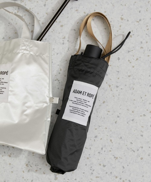 ADAM ET ROPE'(アダムエロペ)の「【定番人気】 CORTED UMBRELLA 53 with tote(折りたたみ傘・レディース・ホワイト系その他/ブラック・FREE)」の1枚目の写真
