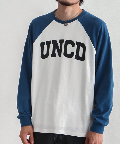 UNCORD(アンコード)の「【UNCORD】LOOSE RAGLAN T-SHIRT/プリントラグランロングスリーブTシャツ(Tシャツ/カットソー・レディース・ホワイト×グリーン/ホワイト×ブルー/ホワイト×ブラック/オートミール/ホワイト系/ホワイト系1/ホワイト系2/アイボリー系・MEDIUM/LARGE/X-LARGE)」の1枚目の写真