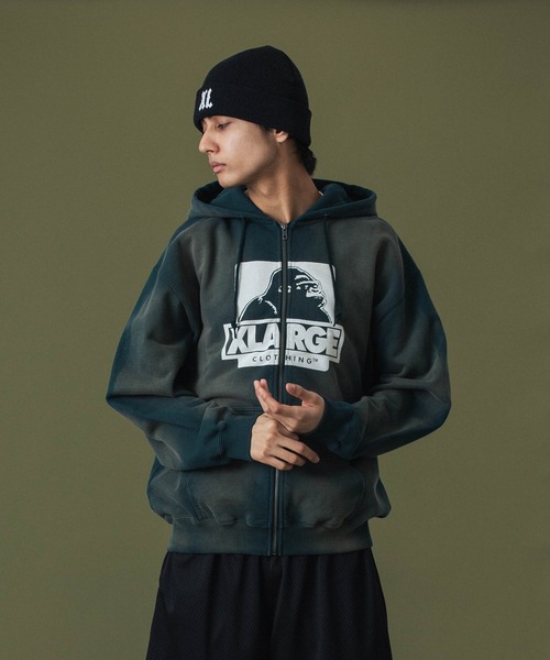 XLARGEダークグレー フルジップパーカー DISCHARGE PRINTED OG ZIP HOODED SWEATSHIRT(パーカー