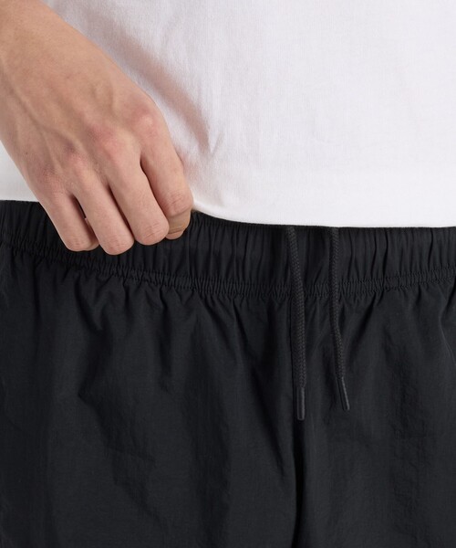NEW BALANCE(ニューバランス)の「New Balance/ニューバランス S.O ウーブンナイロン ショーツ/MS51742(その他パンツ・メンズ・ブラック・MEDIUM/SMALL/X-LARGE/LARGE)」の4枚目の写真