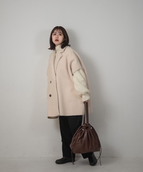 Amiur(エミレ)の「mouton poncho over vest(ベスト・レディース・ブラック/モカ/アイボリー・FREE)」の5枚目の写真