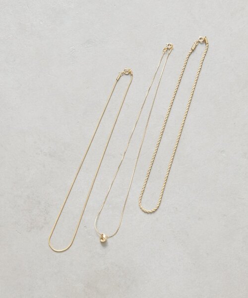 Jena espace merveilleux（ジェナ　エスパスメルヴェイユ）の「3連ワンポイントネックレス（リング・レディース・ゴールド/シルバー・FREE）」の4枚目の写真