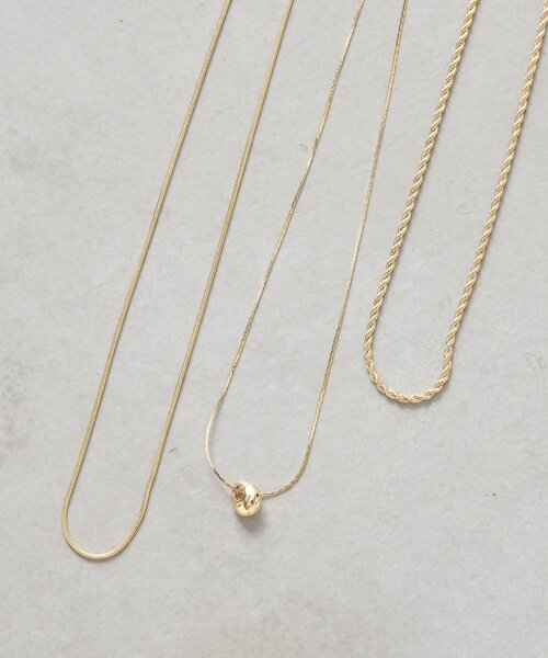 Jena espace merveilleux（ジェナ　エスパスメルヴェイユ）の「3連ワンポイントネックレス（リング・レディース・ゴールド/シルバー・FREE）」の5枚目の写真
