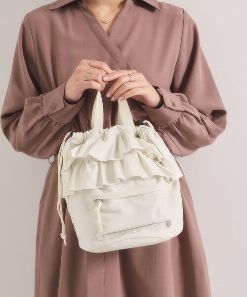 ITS'DEMO(イッツデモ)の「フリルドロストショルダー(ショルダーバッグ・レディース・ブラック/アイボリー・00)」の1枚目の写真