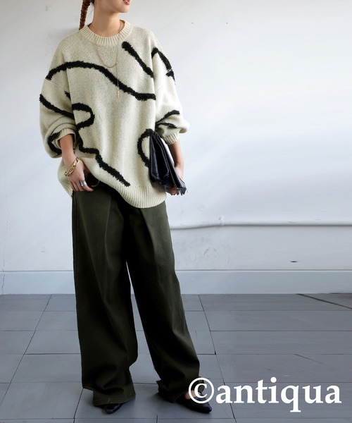 antiqua(アンティカ)の「ニュアンスライン柄ニット(ニット/セーター・レディース・ブラック/アイボリー・ONESIZE)」の11枚目の写真