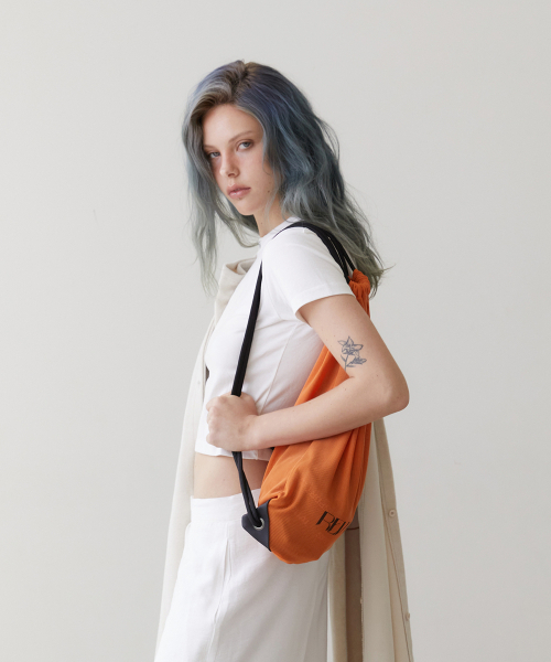 REVOIRSIS（ルヴォアシス）の「RVIS mesh gymsack orange（バックパック/リュック・レディース・オレンジ・FREE）」の3枚目の写真