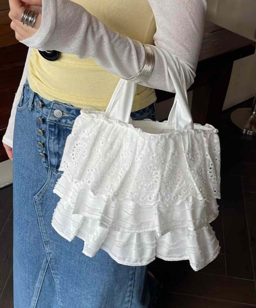 VIBGYOR(ヴィブジョー)の「Liaa/レース フリル ミニバッグ A18795(トートバッグ・レディース・ホワイト/ブラック・FREE)」の1枚目の写真