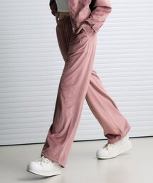 LEATHERY（レザリー）の「リバースロゴベルベットトラックパンツ[ASH ROSE]（スウェットパンツ）」