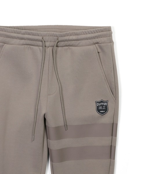 The DUFFER of ST.GEORGE（ザダファーオブセントジョージ）の「〔BLACK LABEL〕"SORONA" ATHLETIC SLIM PANTS：セットアップ ダンボールニット スリムパンツ（スウェットパンツ・メンズ・ブラック/ブラック系その他/グレイッシュベージュ・SMALL/MEDIUM/LARGE/X-LARGE）」の18枚目の写真